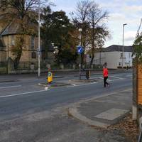 At Worsley Road, turn right and immediately cross via the tactile kerbs and island to St John's Church. Turn right along the pavement.