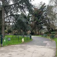 Take the path on the right. Look into the community garden on your right