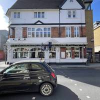Cross the pedestrian crossing and turn left onto Penwith Road.