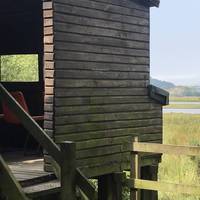 The bird hide overlooks the wide floodplain of the inner Glaslyn Estuary, a haven for waterfowl of many types