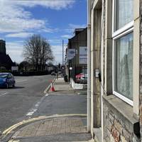 This walk starts at the Two Mile Court bus stop which is served by 10 routes.