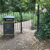 Here you will reach a gate. Walk through.