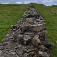 Halfway up this road you will pass through Hadrian's Wall.  Be sure to take in the views.