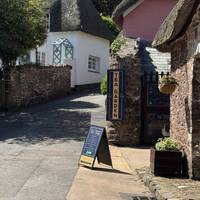 Take a right and head up the hill, passing the tea room.
