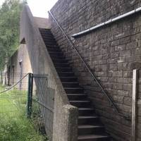 Climb up those stairs.