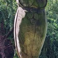 Godfrey the owl stands at the entrance. He is named after Godfrey Kneller the portrait painter who lived in Kneller Hall. Touch the carving.