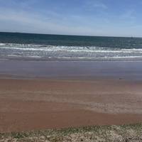 When the tide is in the waves will come up to the path, but when it’s out there’s a nice a sandy beach.