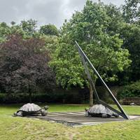 Begin at the Tortoises with Triangle and Time sundial. Sundials can be used more often as London becomes sunnier. Add an hour for BST.