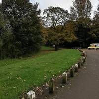 Turn right with the low posts to your left. Take care of any cars arriving or leaving. There is often an ice cream van parked here.