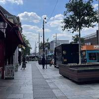 You'll emerge onto the High Street. Looking left you'll see the start of Walthamstow Market.