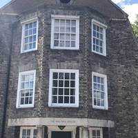 Walk up Malting Lane to the right hand side of the Malting House.  At the end, turn left into Church Rate Walk.