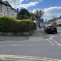 Head towards Alcove Road and turn left onto it.