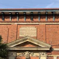 The red brick hall is Vernon Hall. It was established and opened as a museum in 1860.
