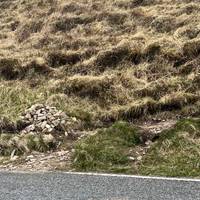 Directly opposite you’ll see a discreet cairn marking the start of the route.