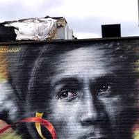 On a wall behind you is this great Bob Marley street art by Dale Grimshaw 