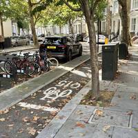 Take the second turning on the right to walk along Kempsford Gardens as it curves round to the left.