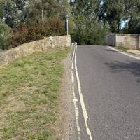 Exit the car park, turn right and cross the road. Head back over the bridge.