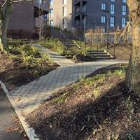 If you have a particular interest in railway history, divert left up steps when you reach Red Clover Gardens.