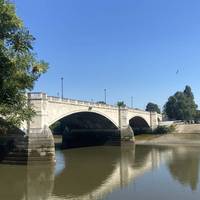 Look back to see the ornate arches of Chiswick Bridge, built from Portland Stone and opened in 1933 on the site of a former ferry crossing.