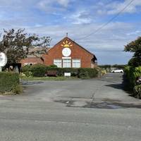 Look left and see the Sunshine Tea Rooms.