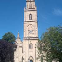 Leave by the gate in front of the church and cross the road. Check both directions even though it is one way.