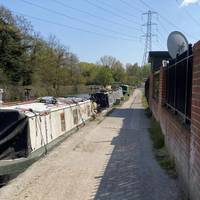 You’ll find a lot of boats moored in different spots along the way. Continue down the River Lee Navigation.