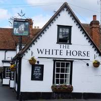 On your right you’ll pass The White Horse pub.