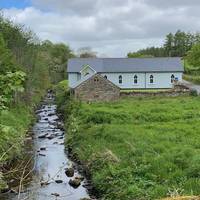 The building on the left beside the stream is Glenelly Presbyterian Church...