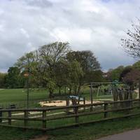 The play park is on the right when you walk down the hill from the car. 