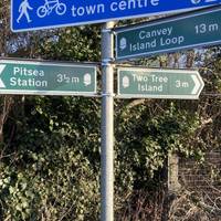 Follow the sign to Two Tree Island. The acorn symbolises the England Coast Path. It will stretch 4,500km around the country when complete!