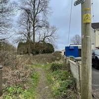 After the last house, turn right by a fingerpost sign for a public footpath.