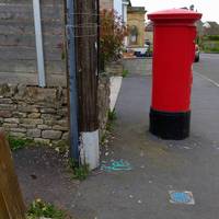 Walk along the High Street to the Post Box and turn left. The path goes through the disues pub garden.