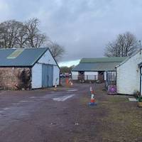 With the cottage on your right follow the path across the farmyard.