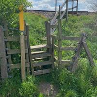 Head over the stile and cross the railway line with caution.