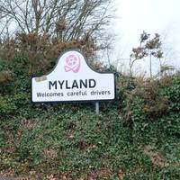 There will be a sign for Myland on this section of the roundabout.