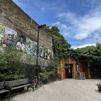 You'll find the entrance to Dalston Curve Garden, an urban oasis which is a great spot to stop and learn more about the area's history.