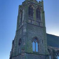 Look for the pigeons hanging out a the top of the church tower.