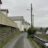 The walk starts in Treknow on Treknow Lane by the public footpath sign. There is no pavement along here.