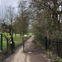 Enter Aireville Park through the gate.