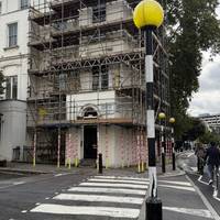 Use the zebra crossing to cross Gloucester Terrace.