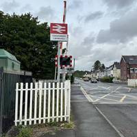 Turn left onto Twyi Avenue. Pay attention to the level crossing lights before continuing.