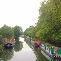 We walked over Regents canal where colourful boats are anchored. 