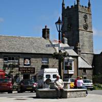 From behind the church, walk through the square and turn left to the side of the Co-op.