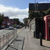 Stay on the pavement and follow it along to the next pedestrian crossing to take you over Park Road North.