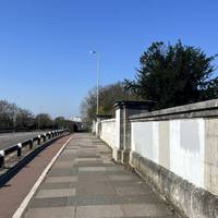 Walk over the bridge. Get ready to turn right on the other side.
