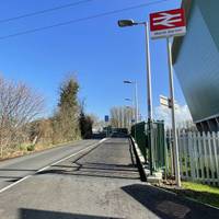 From the entrance of Exeter ERF, turn right onto the shared pedestrian and cycle path alongside Clapperbrook Lane East toward the station.