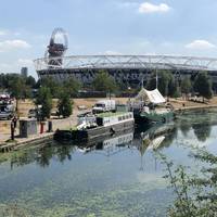 Cross the bridge to the other side of the canal. You’ll see the London Stadium and ArcelorMittal Orbit to your right.