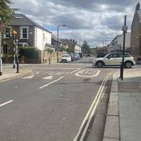 Just to the left of the junction with Barry Road is a zebra crossing. Cross and continue along Goodrich Road.