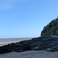 Jackson's Bay has a flat concrete path around to Barry beach when the tide is out. You walk across the sand to get to it.