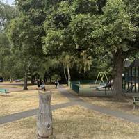 With the Visitor Centre behind you, head down this path with a play area on your right.